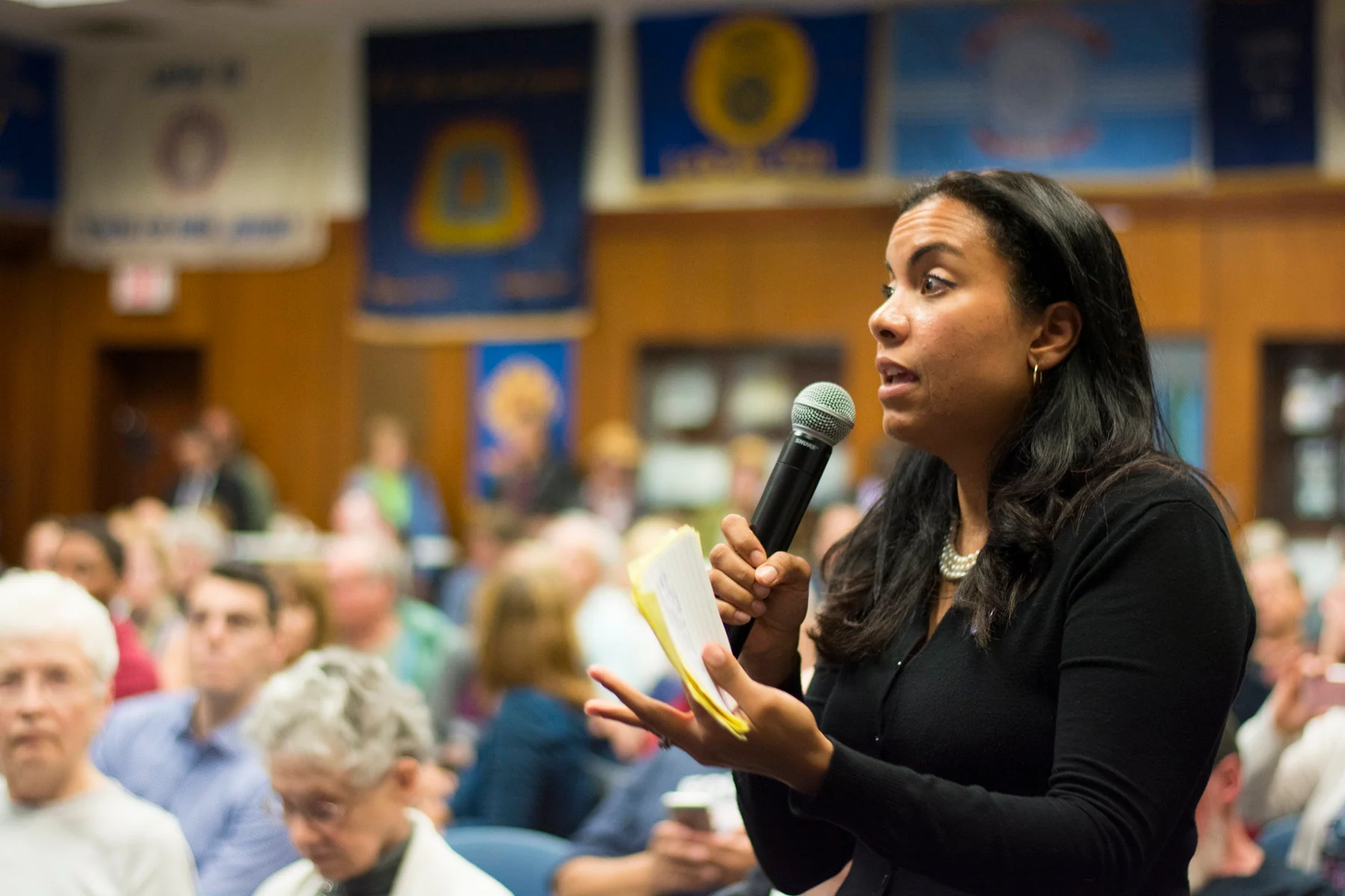 Analilia Mejia speaking at a 2017 town hall